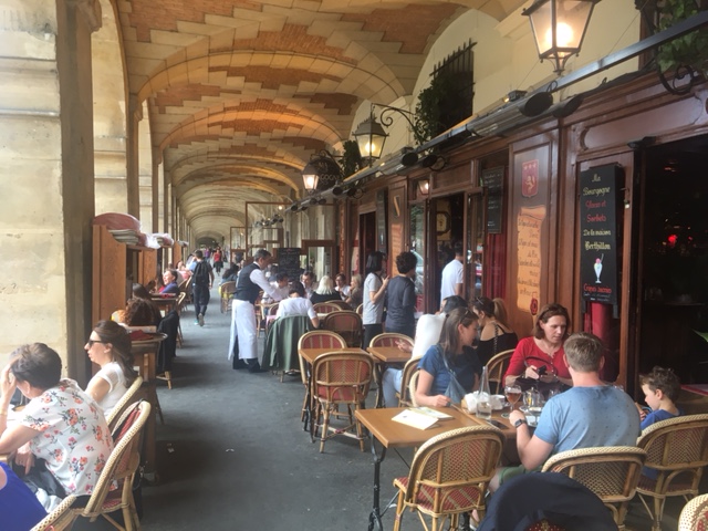Cafe at Place des Vosges (the oldest planned square in Paris)